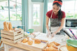 © bank215 - Asian young female cooking with flour powder for bakery bread croissant