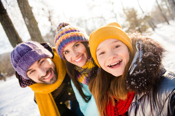 Poster - Photo of lovely family happy positive smile mom dad kid make selfie walk park winter enjoy time together