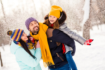 Poster - Photo of lovely family happy positive smile enjoy time together walk snowy park winter frost have fun piggyback