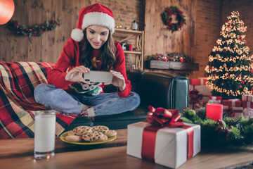 Canvas Print - Photo of funny pretty young lady wear knitted sweater hat smiling tacking photo food drinks indoors house home room