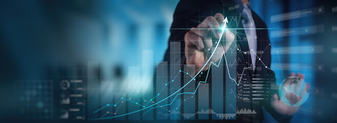 businessman working with modern computer virtual dashboard analyzing finance sales data and economic