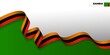 Red, black, and yellow ribbon with white and green background. Zambia independence day background design.