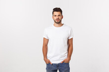 Portrait Of Smiling Young Man In A White T-shirt Isolated On White Background.