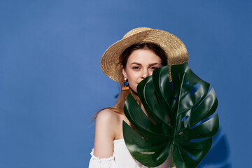 Sticker - attractive woman green palm leaf posing blue background