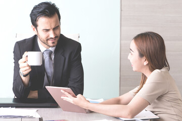 Wall Mural - Portrait of manager and his team at meeting room in office.