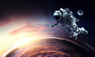 Wall Mural - astronaut at spacewalk . mixed media