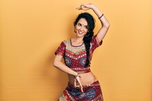 Young Indian Woman Wearing Traditional Belly Dancer Costume. Dancing Exotic Oriental Dance With Body And Hands