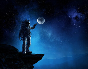 Wall Mural - Astronaut walking on an unexplored planet