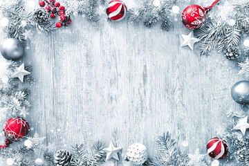Wall Mural - christmas and new year background with fir branches, gift boxes, ornament and snowfall