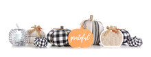 Modern Farmhouse Thanksgiving Decor. Border With Black And White Buffalo Plaid And Rustic Fabric Pumpkins With Grateful Wood Sign Isolated On A White Background.