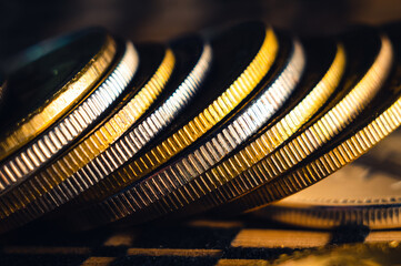 Canvas Print - Closeup of golden bitcoins on a blurry background