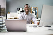 © Andrey Popov - Happy Professional Man Employee Using Computer
