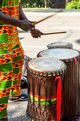 Wall Mural - Senegalese man, playing African drums.