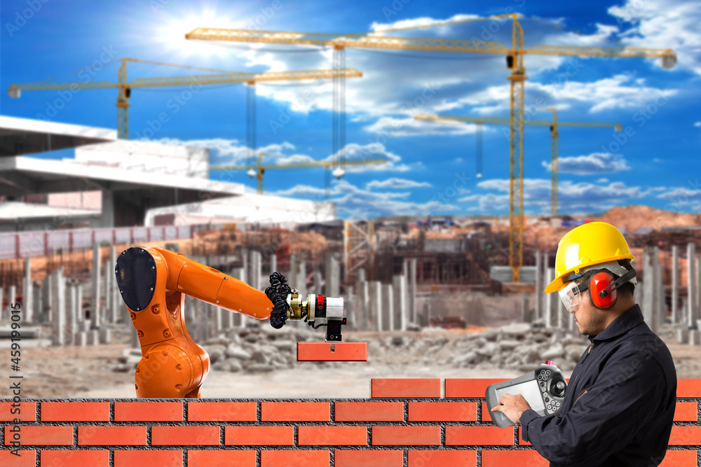 Engineer control working of bricklayer robot working for building brick ...
