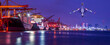 © thanapun - Panorama image of Container cargo ship with ports crane bridge loading dock to terminal in harbor against refinery industrial at twilight
