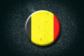 Wall Mural - Belgium flag. Round badge, on a dark background. Signs and Symbols.