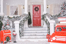 Snowy Courtyard With Christmas Porch, Veranda, Wreath, Christmas Tree, Red Car, Gnome, Letterbox For Santa Claus, Lanterns, Garland. Merry Christmas And Happy New Year