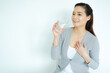 © u photostock - Asia woman drinking water on table