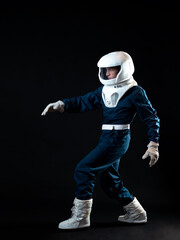 Wall Mural - An astronaut walks in low-gravity conditions. The hero