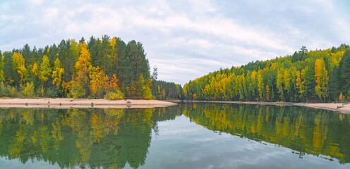Wall Mural - panoramic view of the bright colorful trees along the bank of the kama river russia perm krai. autum