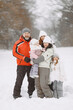 © prostooleh - Big family in winter clothes play in winter park