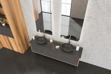 Top view of dark grey bathroom vanity with two on trend sinks