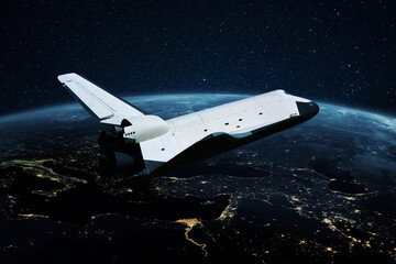 Wall Mural - space shuttle rocket flies in open space over the night planet earth with bright lights of megacitie