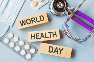 WORLD HEALTH DAY words on wooden blocks. Medical concept.