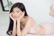 © NT_studio - Beautiful portrait young asian woman sexy in underwear figure fit relax with seductive in bedroom, asia girl body slim in lingerie confident and happy lying on bed in bedchamber, lifestyle concept.