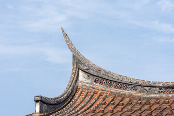 Wall Mural - The eaves and corners of traditional Chinese residential buildings are made of red brick and lime