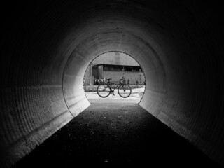 Wall Mural - Bicycle at the end of a tunnel