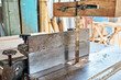 © Cagkan - Industrial band saw machine in a carpentry or lumber workshop.