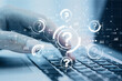 © Who is Danny - Close up of businessman hand typing on laptop keyboard with abstract glowing question marks interface on blurry bokeh background. Technology, faq, online help, problem solution concept.