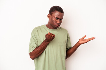 Young African American man isolated on white background showing that she has no money.