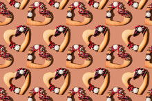 Pattern Of Heart Shaped Cookies Flat Laid Against Brown Background