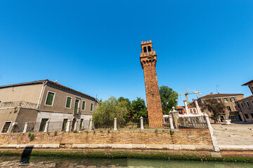 Sticker - The ancient Civic Tower or Clock Tower in Murano island in medieval style. Campo Santo Stefano (Saint Stephen square), Venice, UNESCO world heritage site, Veneto, Italy, Europe. 
