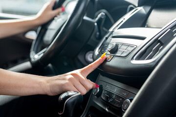 female hand close up in car