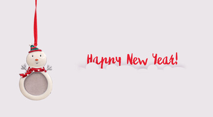 Wall Mural - New year poster with snowman new year photo frame isolated on white background