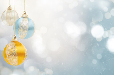 Wall Mural - christmas balls on a blue background with particles