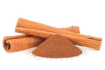 Cinnamon sticks and ground cinnamon isolated on a white background, two sticks and powder.