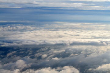 Sticker - Clouds and sky as seen through window of an aircraft