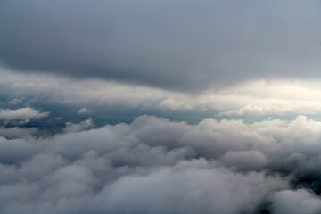 Poster - Clouds and sky as seen through window of an aircraft