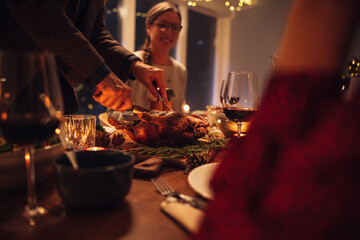 Wall Mural - Family having Christmas dinner at home