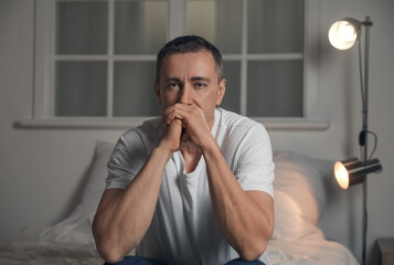 Poster - Depressed mature man in bedroom