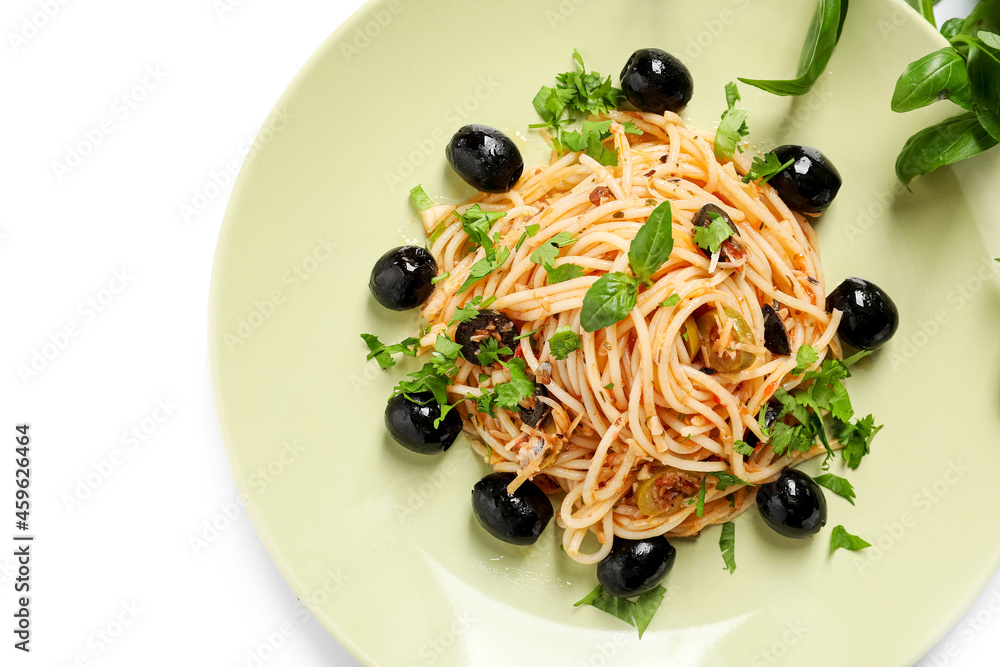 Plate of tasty Pasta Puttanesca on white background, closeup
