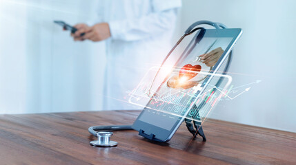 Wall Mural - Medical examination and healthcare business via virtual interface technology.Doctor with stethoscope check and analysing patient heart health and increasing growth graph medical business on tablet.