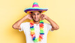 hispanic handsome man feeling stressed, anxious or scared, with hands on head. mexican party concept