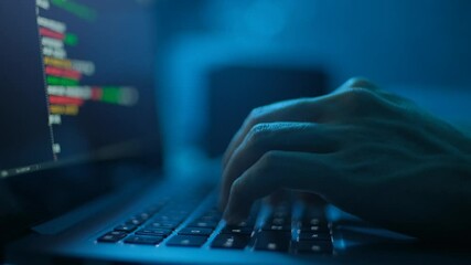 Close up hand of developing programming and coding technologies. Programmer hand typing on keyboard. Put on the wood table at night. Programmer concepts.