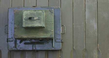 Sticker - ammunition boxes on green wooden background