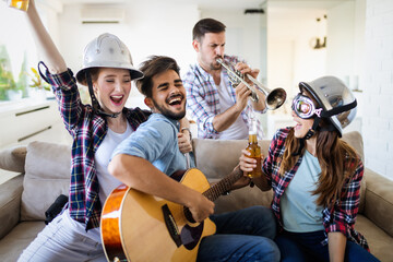 Multiethnic happy group of friends having fun together. People fun party concept